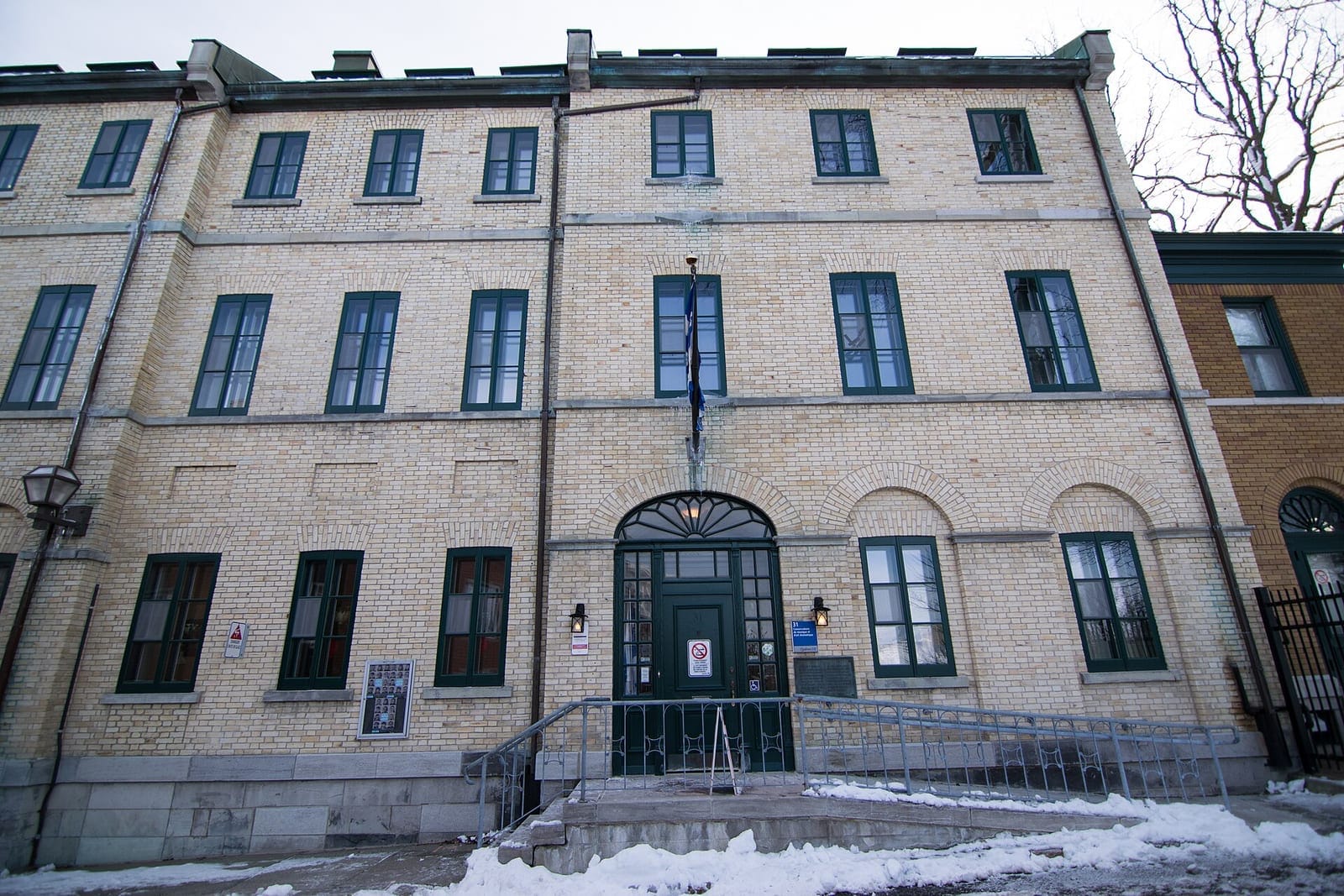 Stone building of the Conservatoire de musique et d'art dramatique du Québec in winter, Quebec City