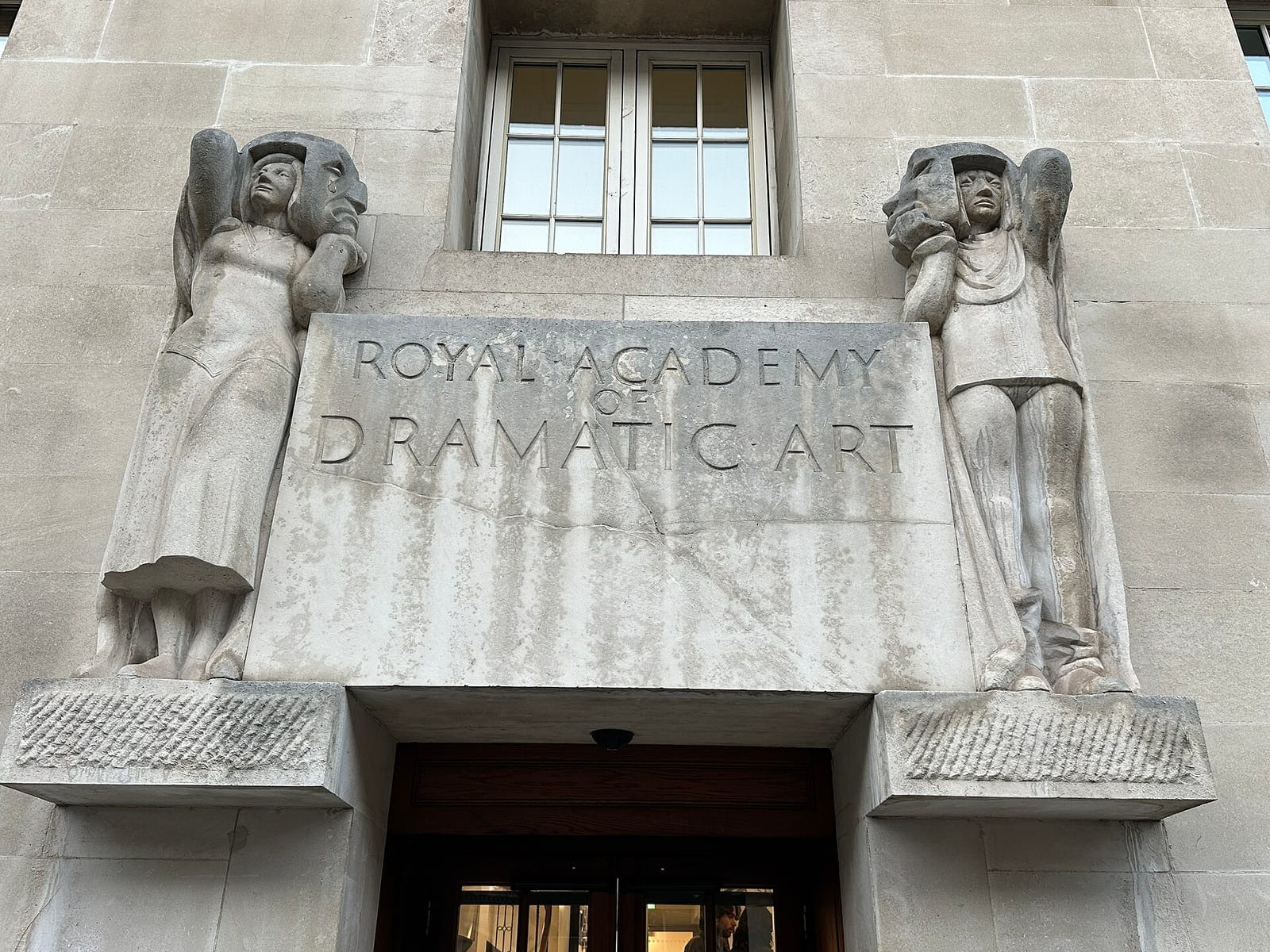 Carved entrance sign of the Royal Academy of Dramatic Art, London