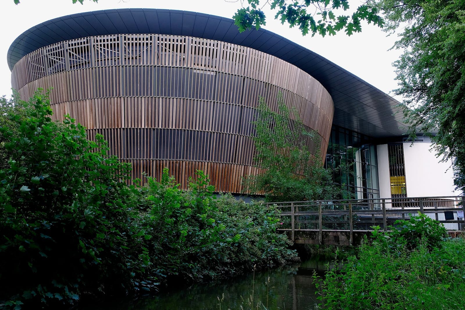 Royal Welsh College of Music & Drama seen from the dock feeder canal in Bute Park, Cardiff